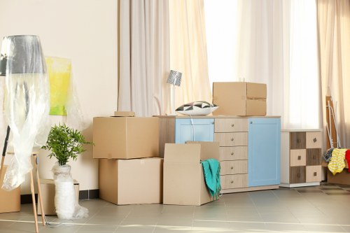 Professional removals team handling furniture in Hornsey