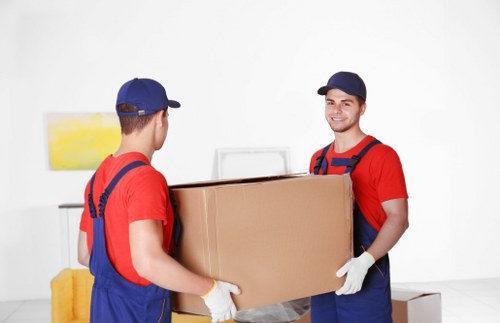 Professional movers handling household items in Stroud Green