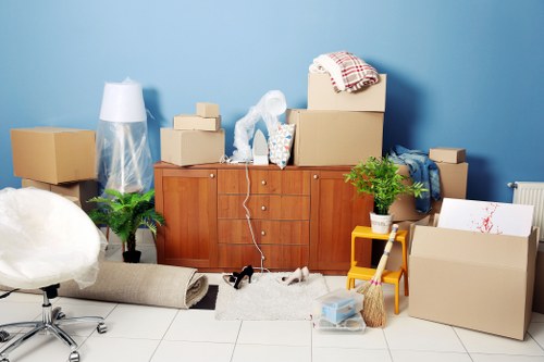 Team of professional movers handling belongings in White City